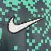 maillotsportingprematchnike.jpg Sporting CP Vorbereitungstrikot 2024-2025 Stoffdetail